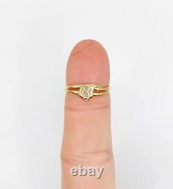 Art Nouveau style ring in 18k gold adorned with a small vintage diamond