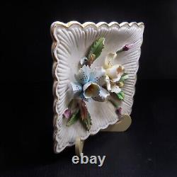 White porcelain plate with vintage flower in barbotine, AMC Art Nouveau Italy N7302